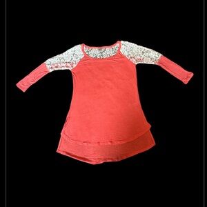 Coral blouse w/ white lace across shoulders & sleeves